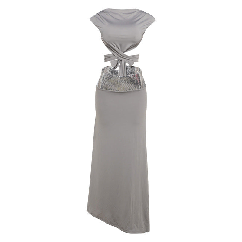 Elegant Backless Top Paired With A Patchwork Maxi Skirt
